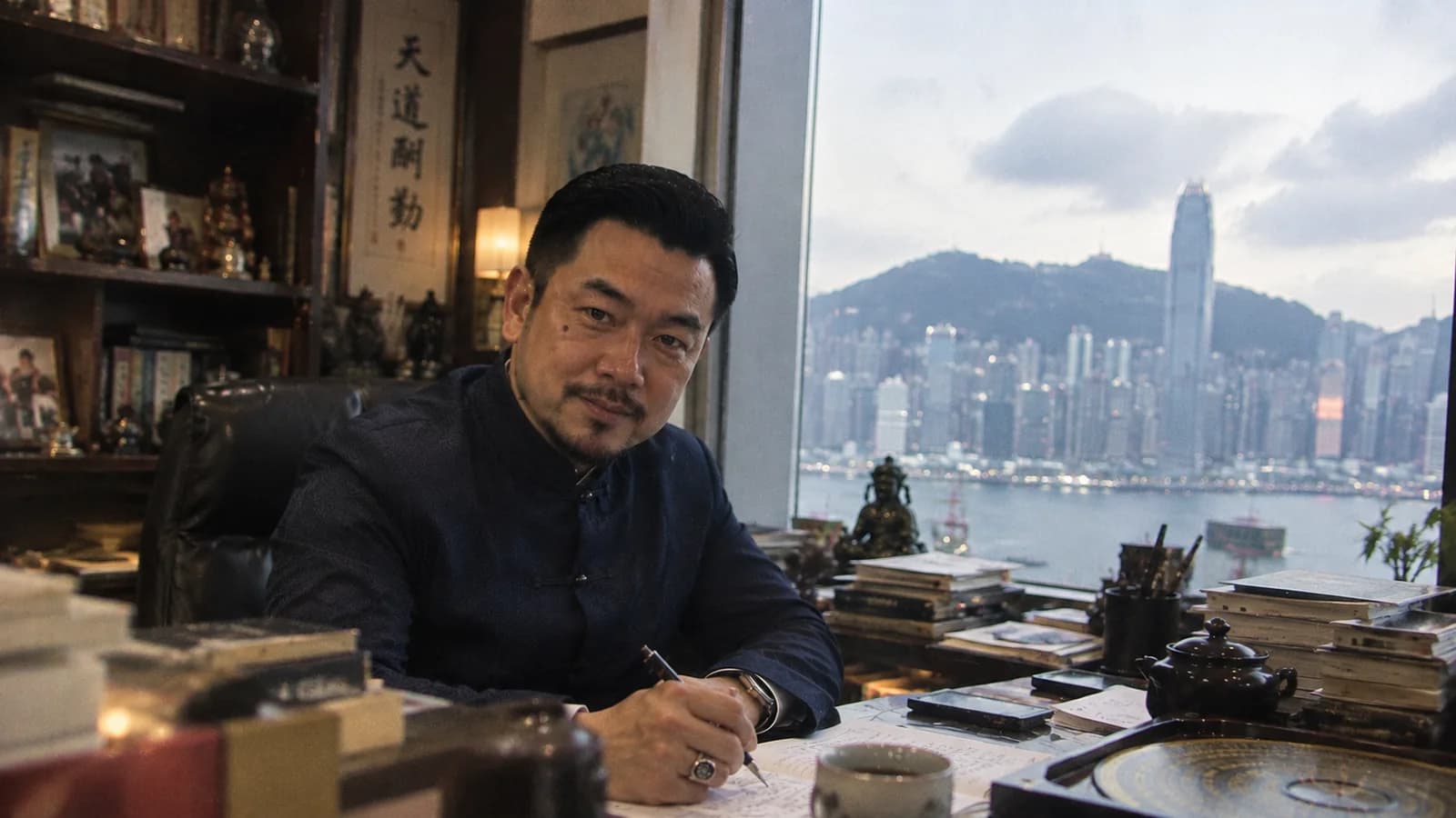 J. Luo at a Hong Kong consultation desk